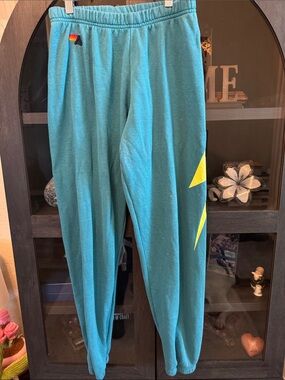 Aviator Nation Teal Sweatpants with Yellow Lightning Accent